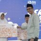 BRI ketika menyantuni anak yatim piatu. Foto: Humas BRI