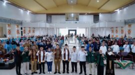 pJ Sekdaprov Lampung, M. Firsada, saat mengabadikan momen diacara yang digekar Ormawa FDIK