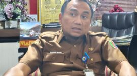 Plt Kepala BPKAD Provinsi Lampung, Nurul Fajri, saat ditemui di ruang kerjanya. Foto| Agis